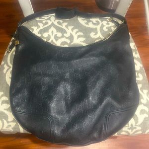 Gucci - Authentic Gucci Purse in excellent condition.  It has two tiny marks on